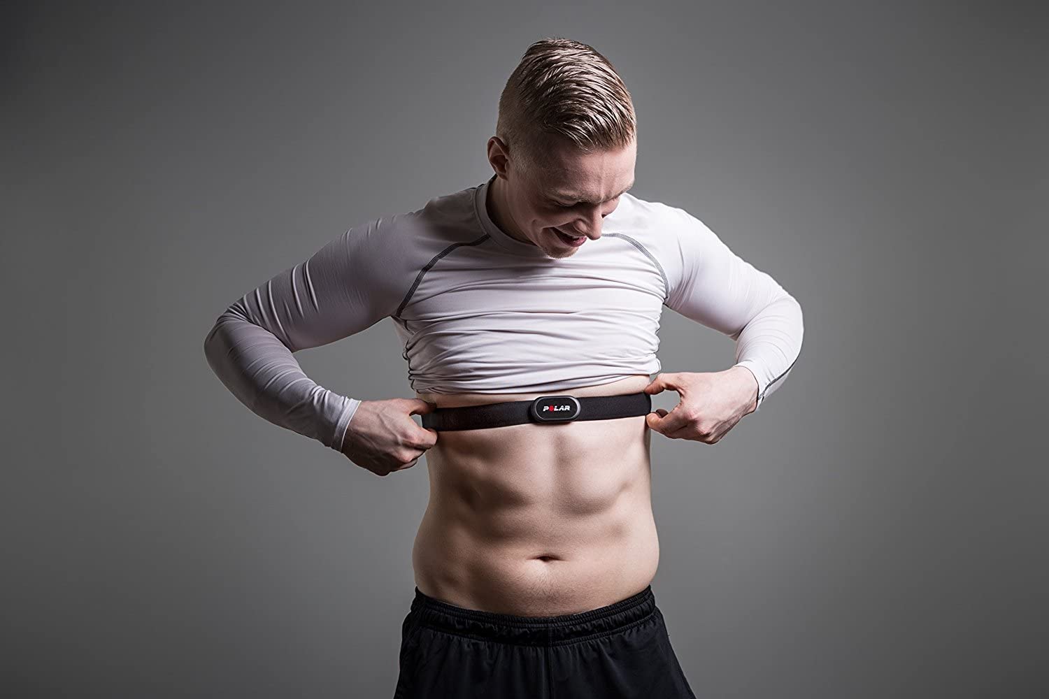 Man fitting Polar Bluetooth H10 Heart Rate Sensor