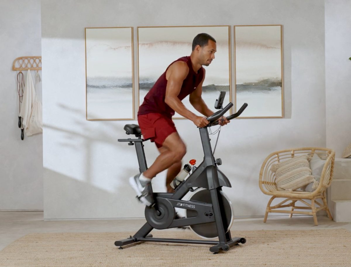 man using JTX Cyclo 3M Exercise Bike for a workout